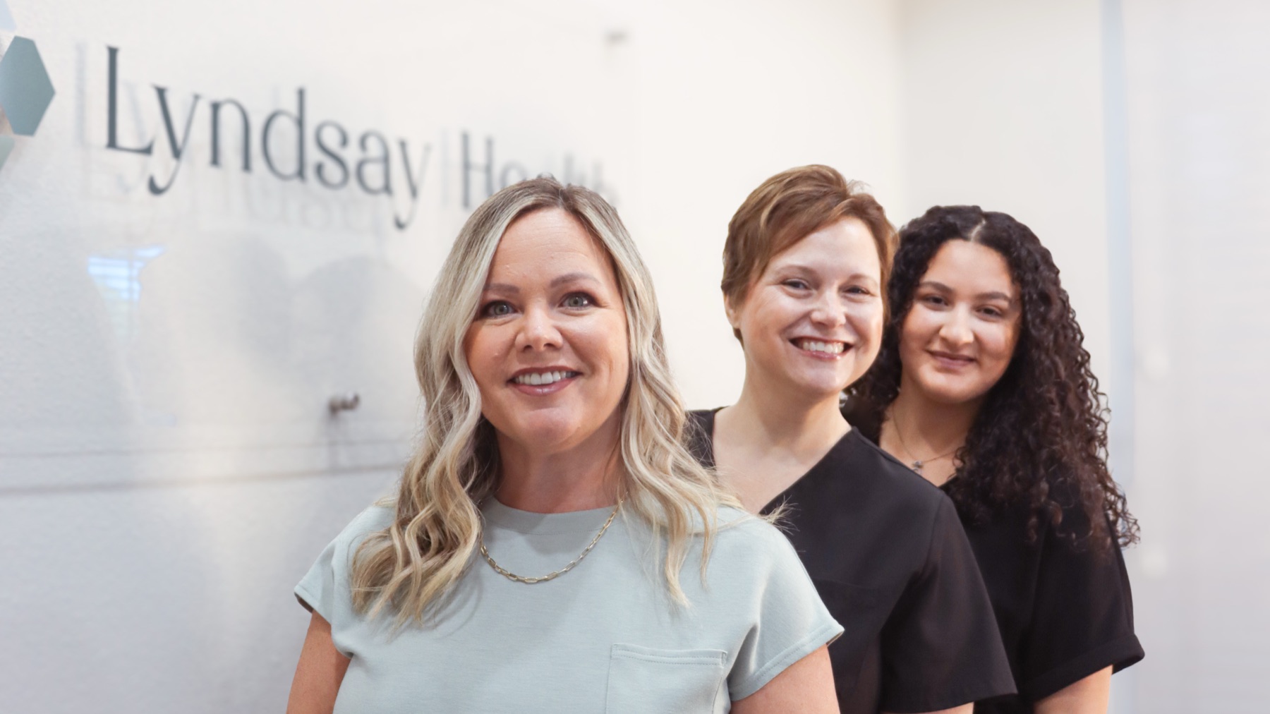 Nikki McWaters with the Lyndsay Health team inside the Lakeland office